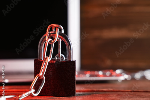 Padlock with chain on table...