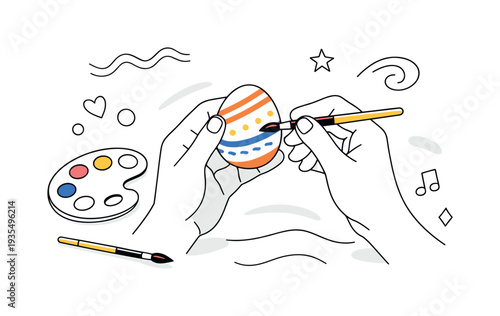 DIY creative workshop. Hands carefully painting geometric stripes and dots on a white egg, small brush and