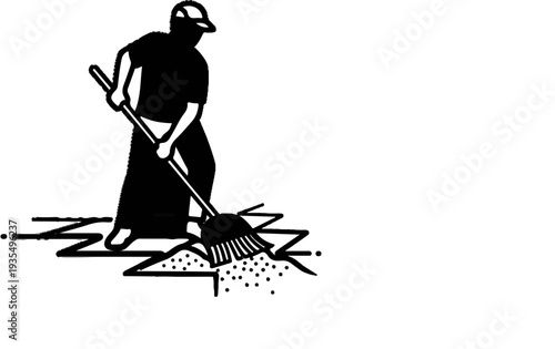 Person in cap and apron sweeping debris with broom