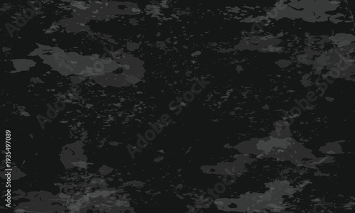 Dark abstract background with irregular grey and black splatters and smudges creating a moody, textured, and grunge-like visual effect