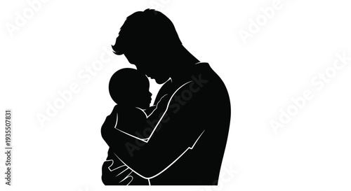 Silhouetted image of a father tenderly holding a baby in a loving embrace