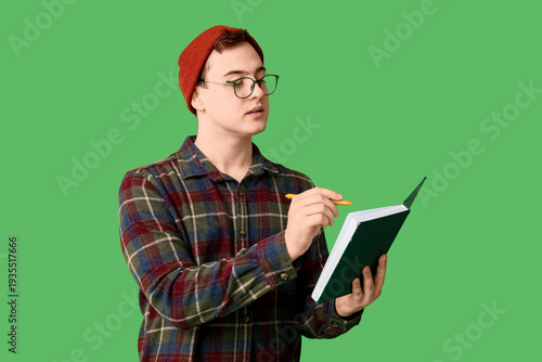 Young man in hat and with n...