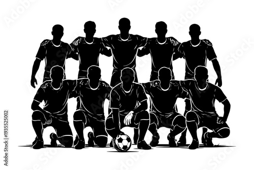 Silhouetted soccer team posing with ball in formation.