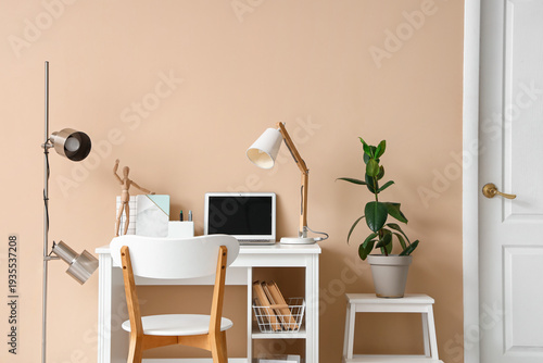 Stylish workplace with mode...