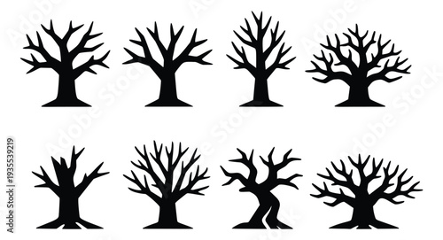 Stylized bare tree icon set featuring various leafless silhouettes for seasonal and Halloween designs