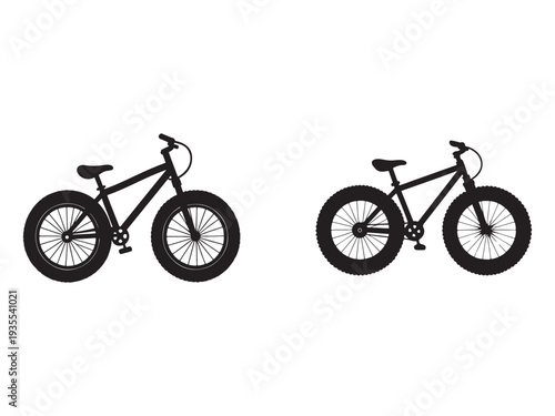 Two black fat tire bicycles side by side with thick tires and sturdy frames in profile view  bicycles have wide wheels and strong build for off road riding