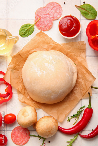 Raw dough and ingredients f...
