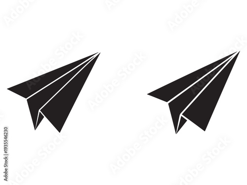 Two black paper airplanes flying side by side on white background