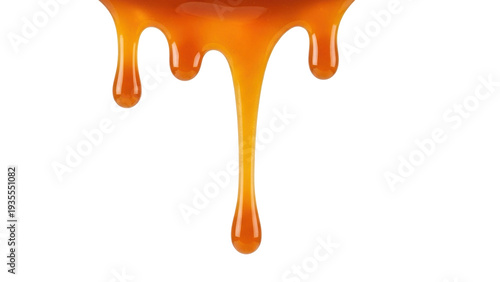 Isolated caramel dripping, amber-colored liquid texture with a viscous syrup consistency