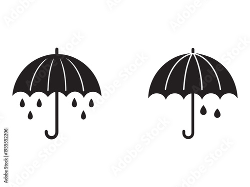 Two black umbrellas with raindrops on a white background  rain protection concept