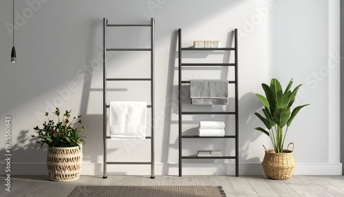 Modern room with two ladder-like towel racks, plants, and towels near a white wall