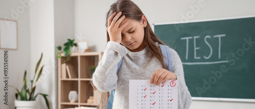 Upset schoolgirl with resul...