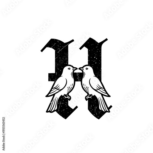 Fotografie Gothic letter H with two birds facing each other