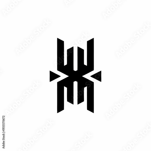 Abstract black geometric symbol resembling a spider or insect.