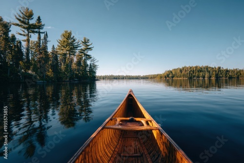 Wooden canoe on calm lake surrounded by trees calm water 4