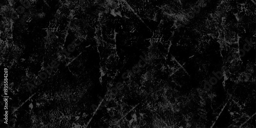 Abstract Dark black stone wall grunge aged rough texture background. closeup texture of black color. Gray concrete cracked walls in the background. White and black messy wall stucco texture background