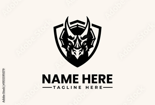 Free Download A black and white illustration of a bull's head logo with a shield, accompanied by placeholder text for a name and tagline on a beige background. - GFXLoad