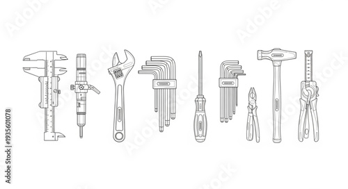 Collection of precision measuring tools and wrenches.