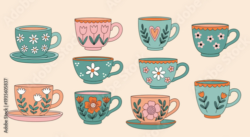 Assorted tea cups with floral patterns in pastel colors.