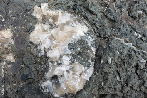 Narural stone formation filled with calcite crystals