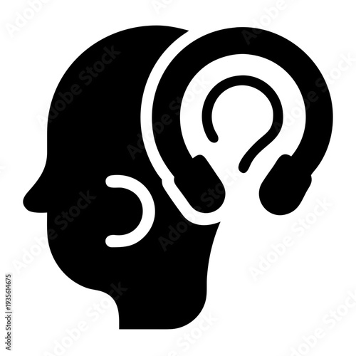 Silhouette of a person wearing over-ear headphones for audio listening or communication
