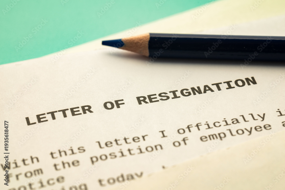 Obraz premium Employee resignation letter and pen beside.