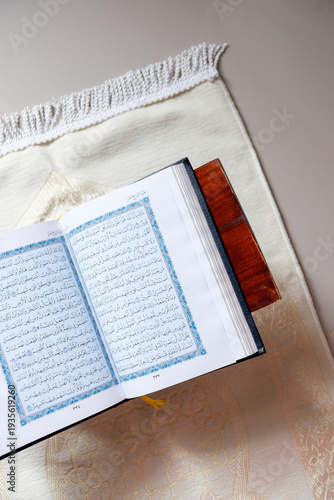 Wallpaper Mural The holy Quran on a rehal, capturing a serene atmosphere of devotion Torontodigital.ca