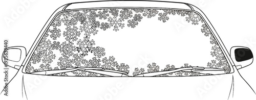 A car's front windshield is covered in many decorative snowflakes, hinting at winter