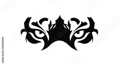 Intense feline eyes and tribal design a striking black silhouette