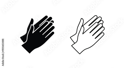 Two hands clapping one solid one outlined a striking silhouette