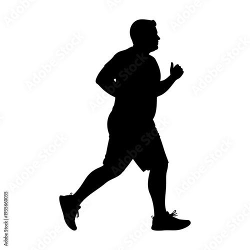 Side view silhouette of a middle aged man jogging for fitness and health