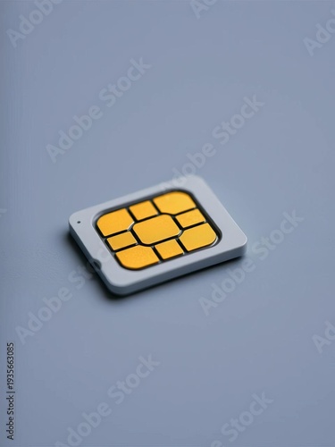 Close up of a micro SIM card lying on a plain surface, showcasing its intricate details,  technology,  close up