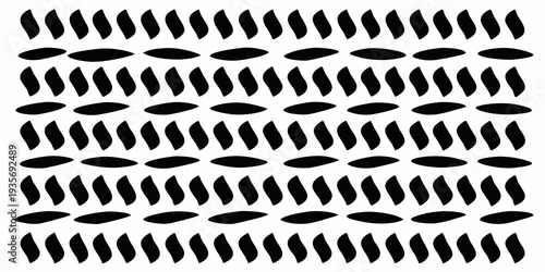 Abstract pattern of repeating black shapes on a white background