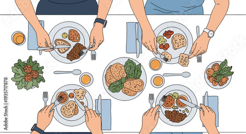 People eating at a table with plates of food and utensils