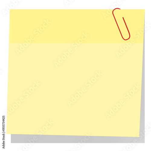 Yellow sticky note with paperclip