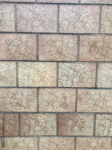 pattern of old ceramic covering of a wall