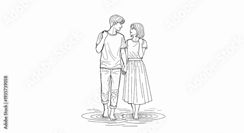 Couple standing barefoot holding hands in shallow water