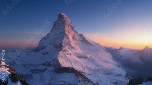 Mountain Peak Illuminated by Beautiful Sunrise or Sunset Light