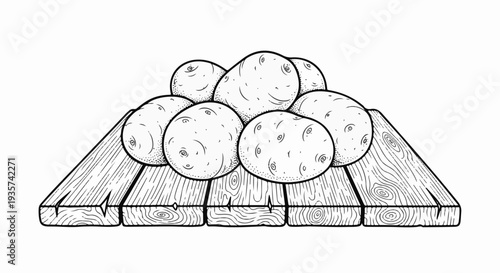 A pile of potatoes rests on a rustic wooden surface