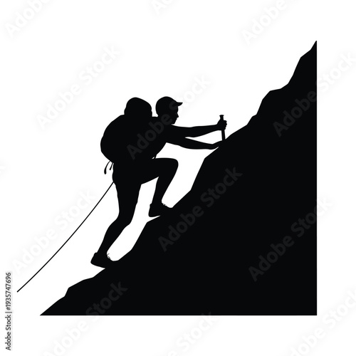 Silhouette of a hiker ascending a steep rocky mountain slope