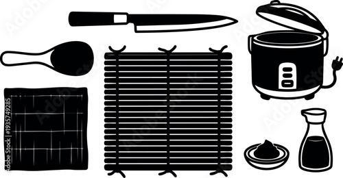 Flat design sushi preparation kit with knife rice paddle bamboo mat rice cooker soy sauce and wasabi close up overhead