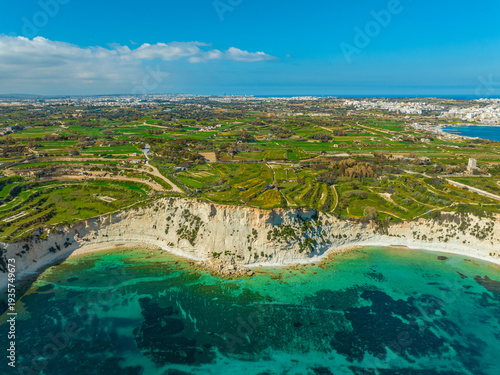 Drone view of Maltese nature, green fields, hills, sea. South part of Malta island