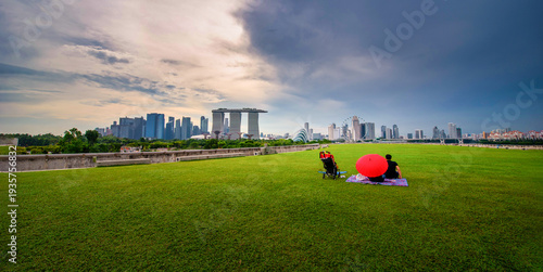 Canvas Print Singapore city Skyline and view of skyscrapers on Marina Barrage at sunset