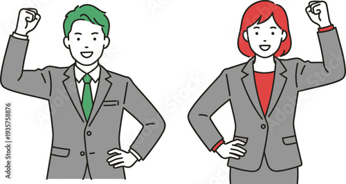 Two confident people in business suits raising fists two people