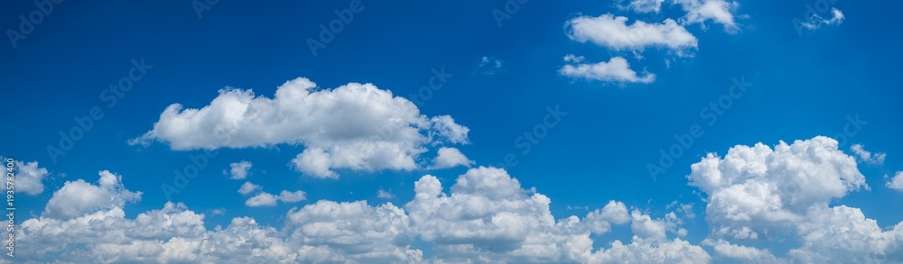 Fototapeta premium Panoramic blue sky with white clouds. Nature background.