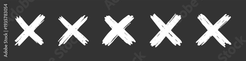 Collection of five hand-drawn white X marks in a sketchy chalk style isolated on a dark background. Grunge cross icons for error, cancel, or rejection.