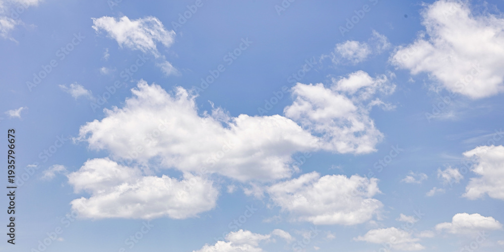Fototapeta premium Blue Sky with White Fluffy Clouds Natural Background