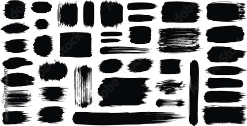 Collection of black brush strokes and shapes on a white background