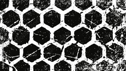 Grunge black and white hexagonal pattern texture with distressed, rough and worn vintage effect