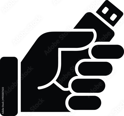 A hand holding a usb flash drive